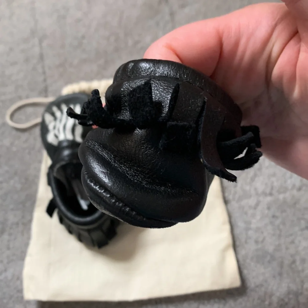 Freshly Picked Black Moccasins with White Skeleton Print